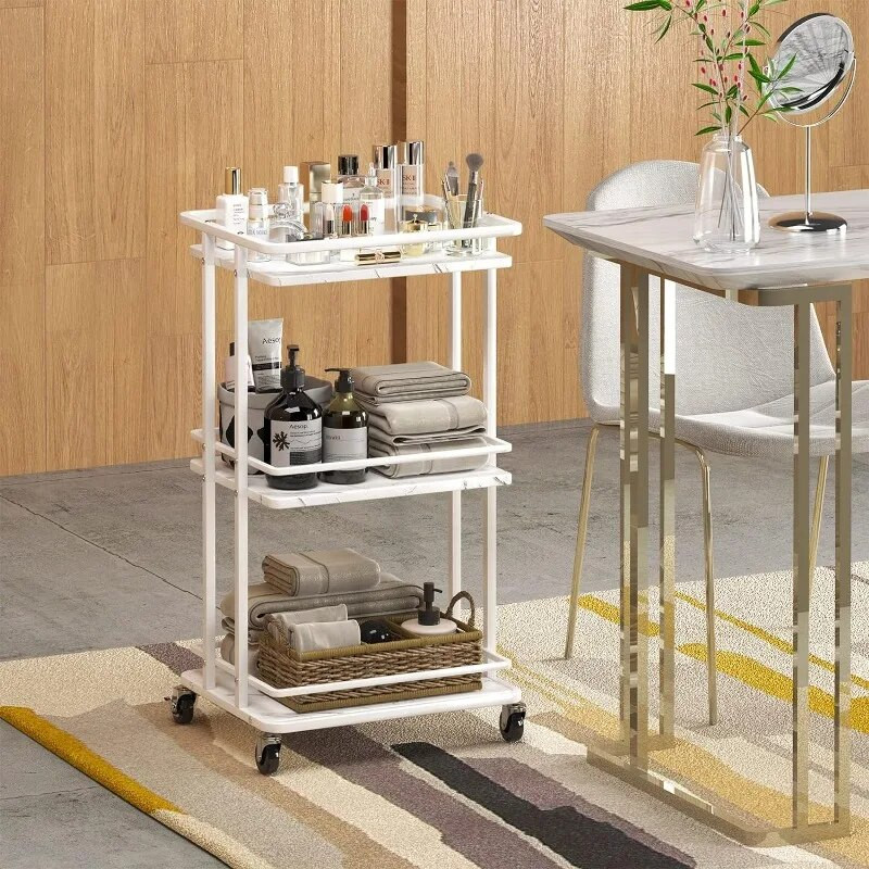 White rolling bar cart with toiletries and towels